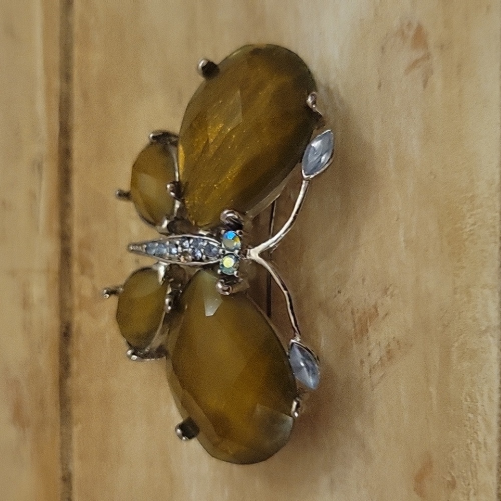 Vintage yellow/green rhinestone butterfly brooch.